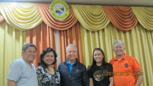 Alegria Mayor (second from left) welcomes Perlas.